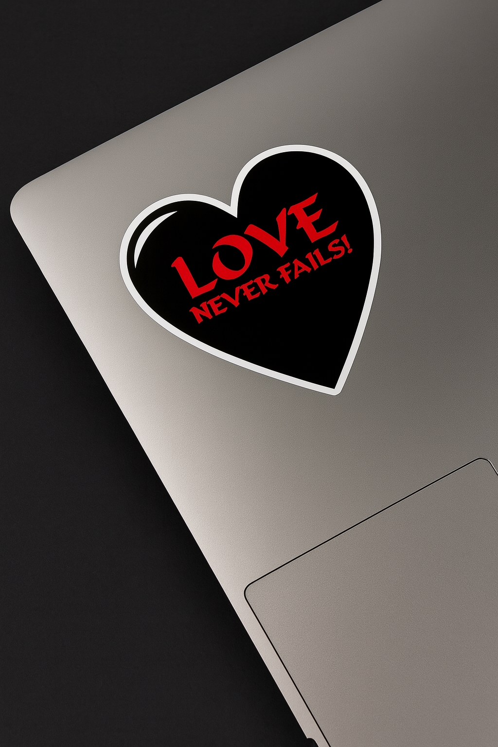 Love Never Fails – Black Heart Sticker